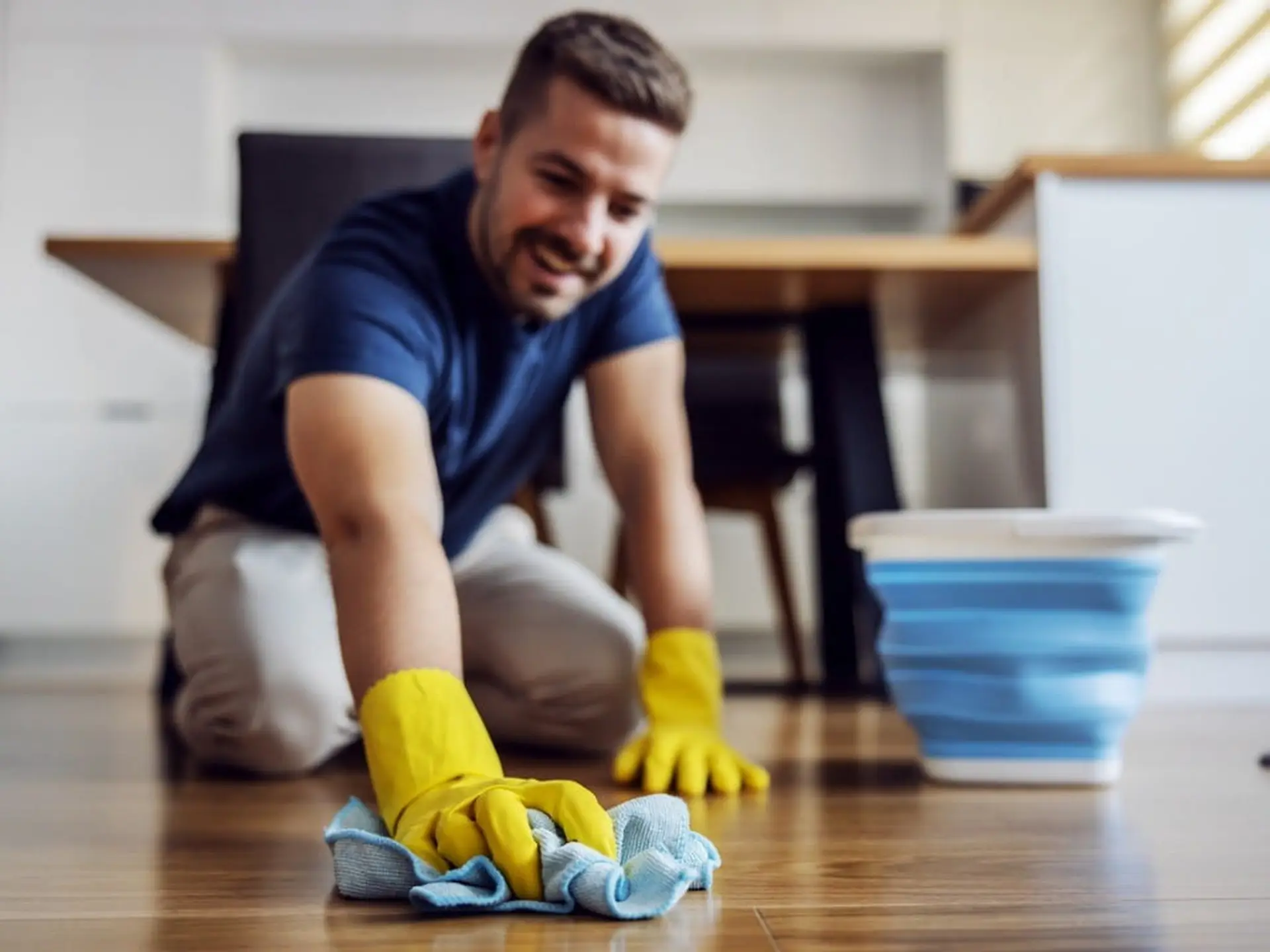 man cleaning floor