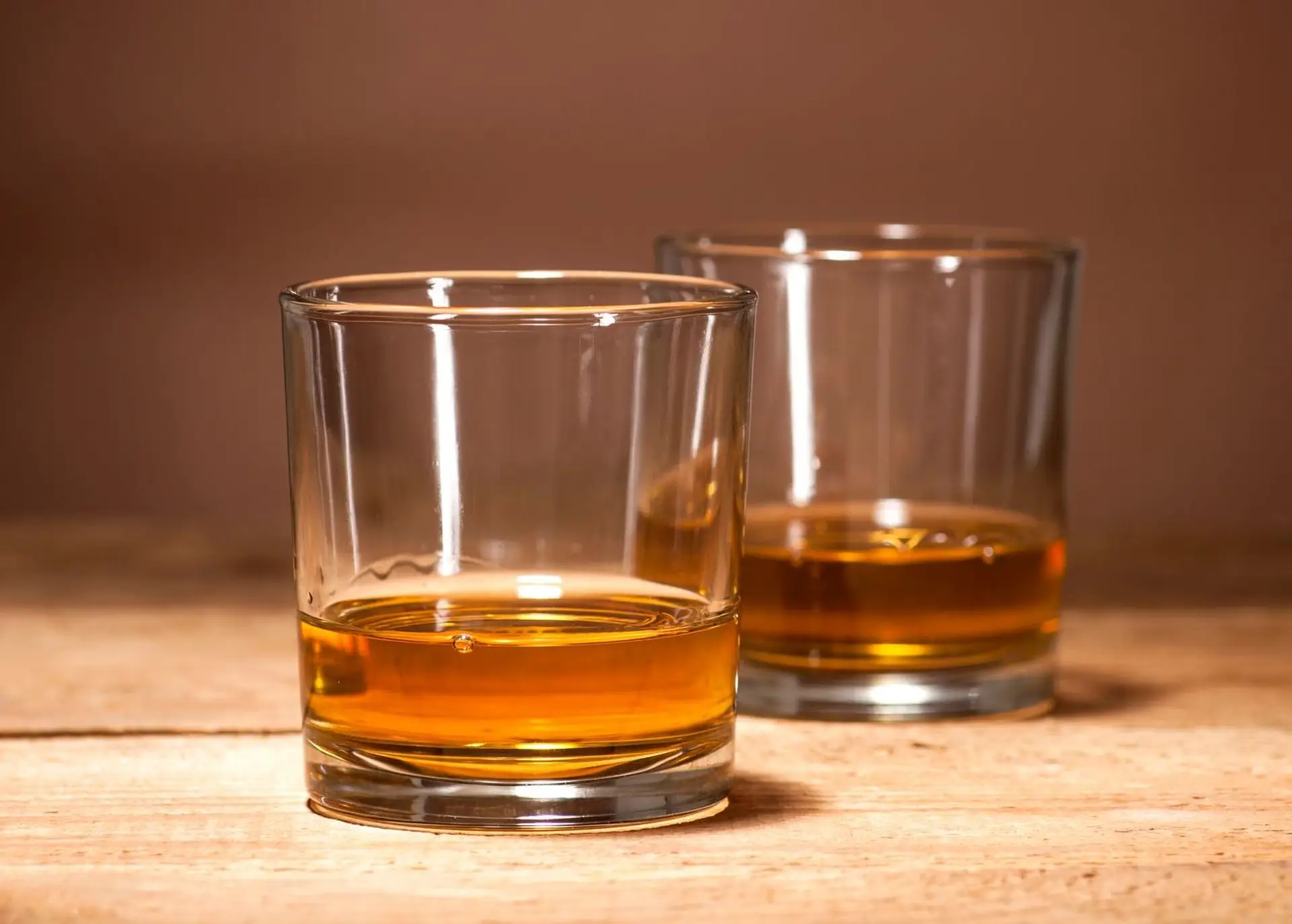 golden yellow liquid in glasses