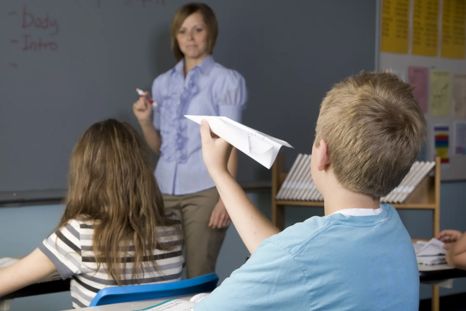 Kid with paper airplane