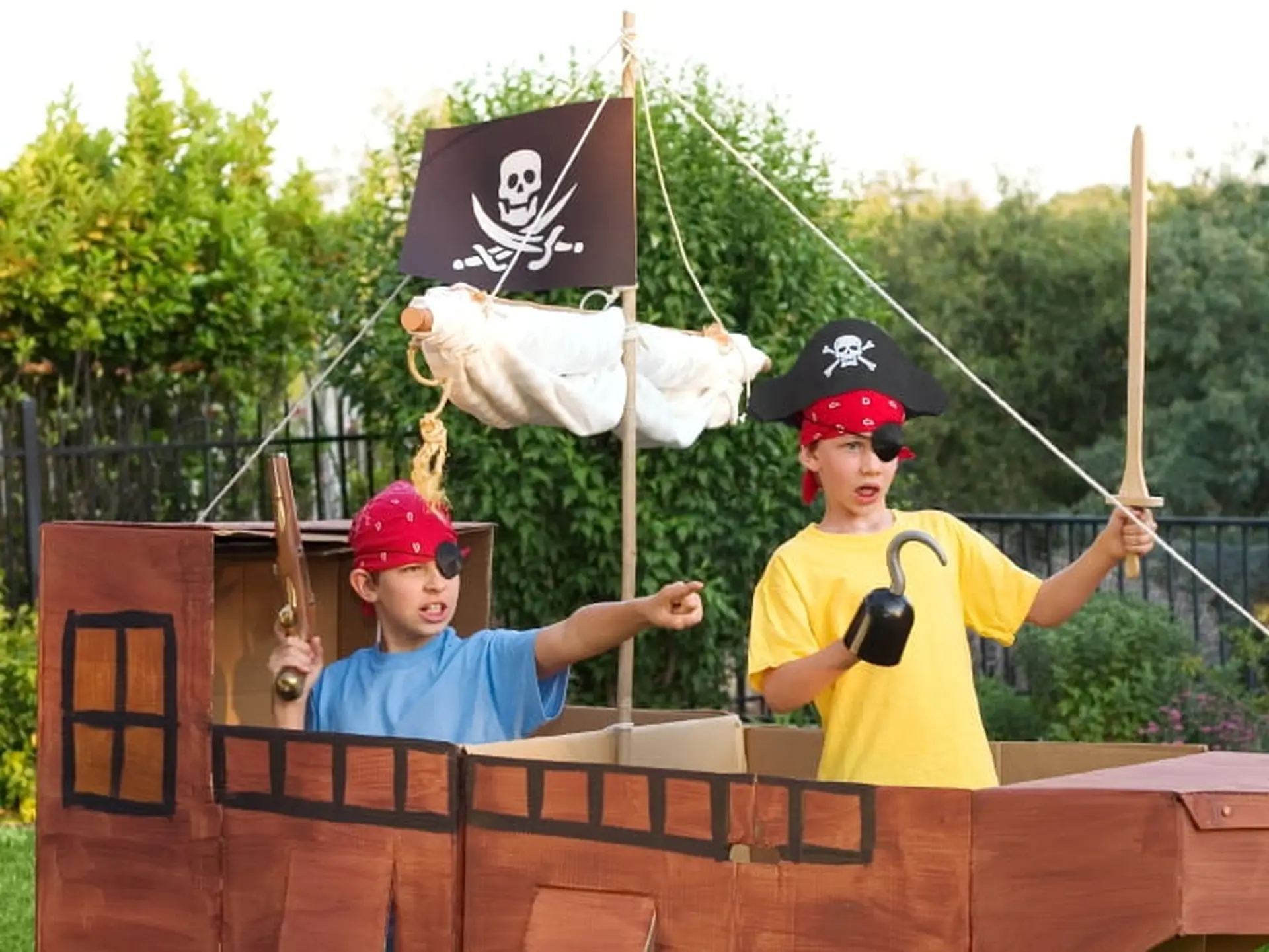 boys playing on pirate ship